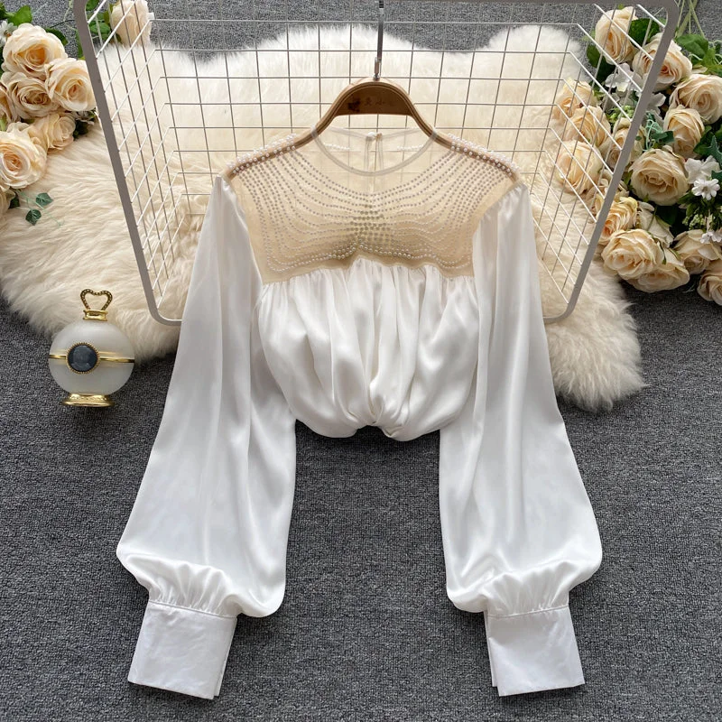 Reduced Rates Cute satin see through long sleeve tops      S533